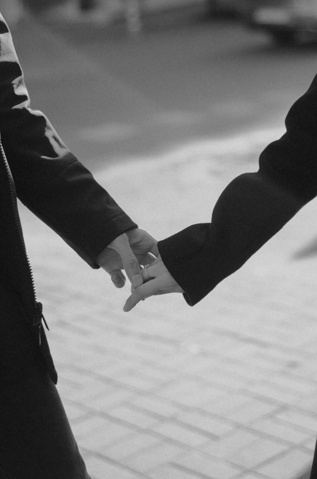 Two business professionals shaking hands after a strategy meeting